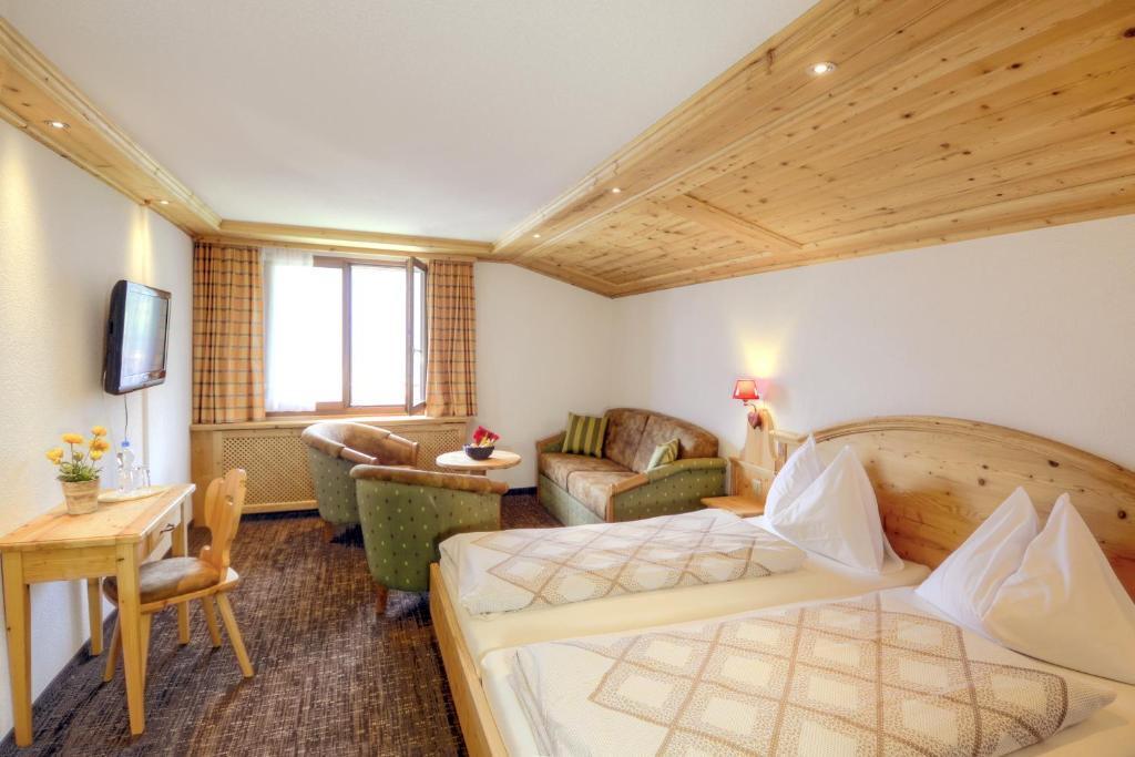 Hotel Restaurant Alpina Grindelwald Pokoj fotografie