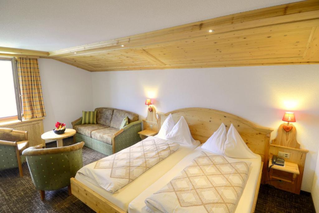 Hotel Restaurant Alpina Grindelwald Pokoj fotografie